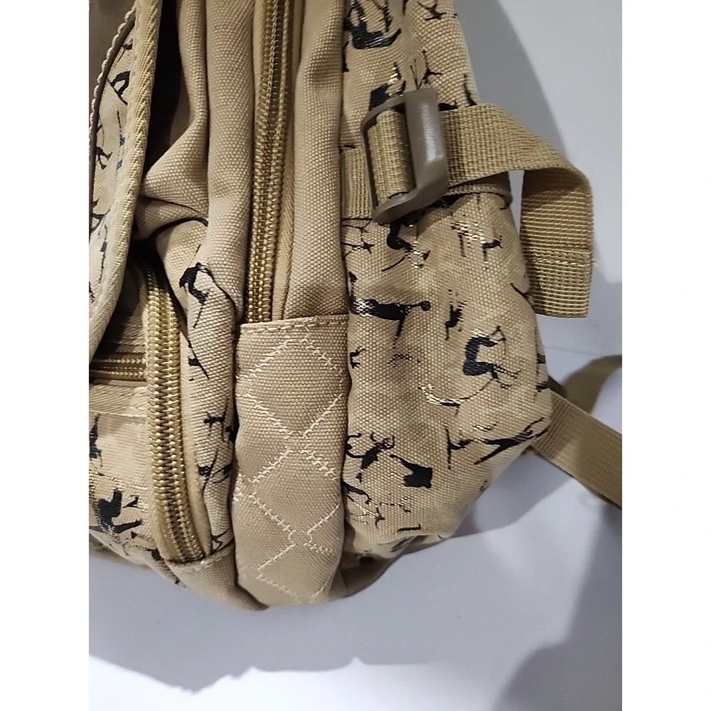 Tan Khaki Canvas Backpack Silhouette Print Multi Pocket Travel Bag